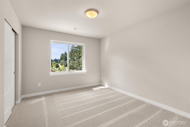 9645 7th Ave SE, Lacey, WA 98513 - unfurnished bedroom featuring carpet flooring and a closet