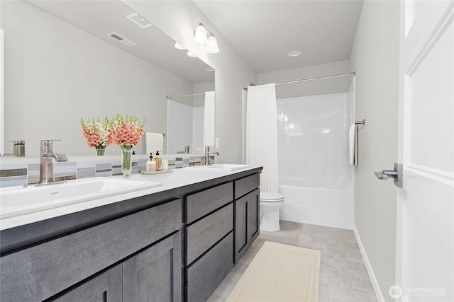 9645 7th Ave SE, Lacey, WA 98513 - bathroom with double vanity and shower / bath combo with shower curtain