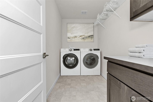 9645 7th Ave SE, Lacey, WA 98513 - laundry room with washing machine and clothes dryer and cabinet space