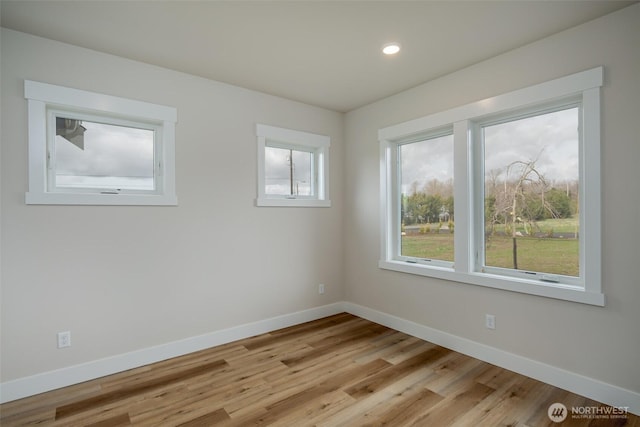 3848 Marine Way, Bellingham, WA 98225 - spare room featuring baseboards, light wood finished floors, and recessed lighting