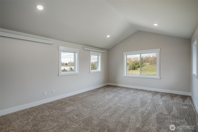 3848 Marine Way, Bellingham, WA 98225 - carpeted empty room featuring plenty of natural light, vaulted ceiling, baseboards, and recessed lighting