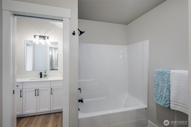 3848 Marine Way, Bellingham, WA 98225 - bathroom featuring shower / bath combination, vanity, and wood finished floors