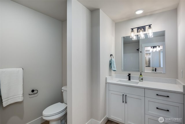 3848 Marine Way, Bellingham, WA 98225 - bathroom with vanity, toilet, and baseboards