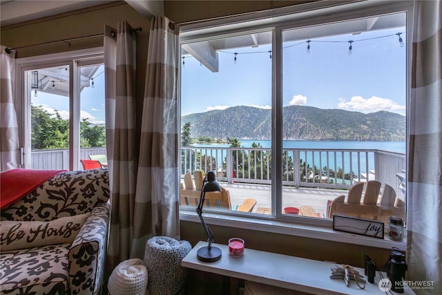 135 Furey Ave, Manson, WA 98831 - living area featuring plenty of natural light and a water and mountain view