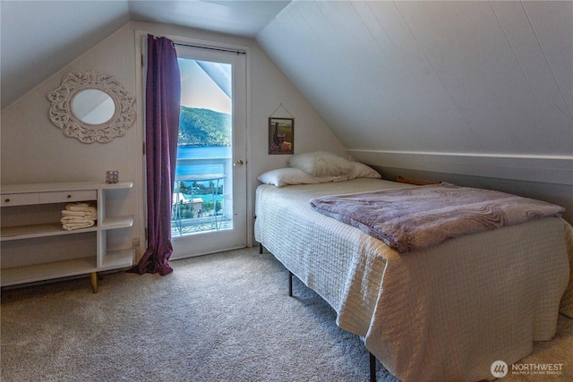 135 Furey Ave, Manson, WA 98831 - bedroom with access to exterior, vaulted ceiling, and carpet