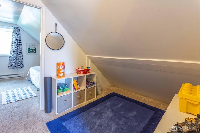 135 Furey Ave, Manson, WA 98831 - rec room with baseboard heating, lofted ceiling, and carpet flooring