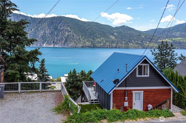 135 Furey Ave, Manson, WA 98831 - water view with a mountainous background and stairway