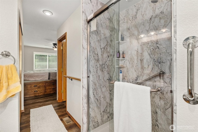 1228 Tabitha Ct NW, Olympia, WA 98502 - ensuite bathroom with wood finished floors, a marble finish shower, and ceiling fan