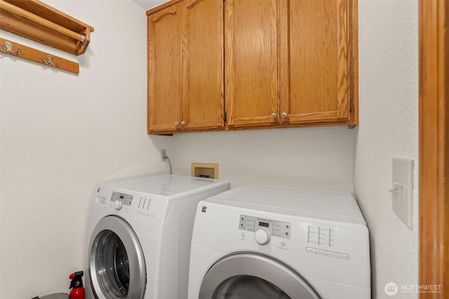 1228 Tabitha Ct NW, Olympia, WA 98502 - laundry room featuring washer and dryer and cabinet space