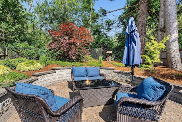1228 Tabitha Ct NW, Olympia, WA 98502 - fenced backyard featuring a fire pit and a patio