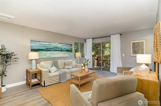 17109 NE 45th St Unit 36, Redmond, WA 98052 - living area with light wood-style floors and baseboards