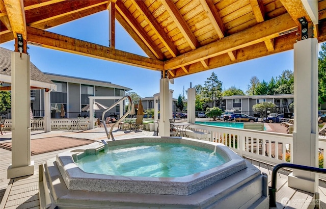 17109 NE 45th St Unit 36, Redmond, WA 98052 - view of swimming pool featuring an outdoor hot tub, a gazebo, and a patio area