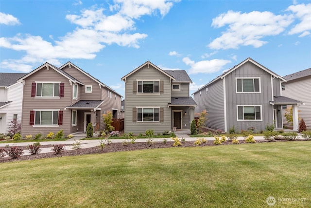 15834 205th Ave E, Bonney Lake, WA 98391 - traditional-style home featuring a front yard and board and batten siding