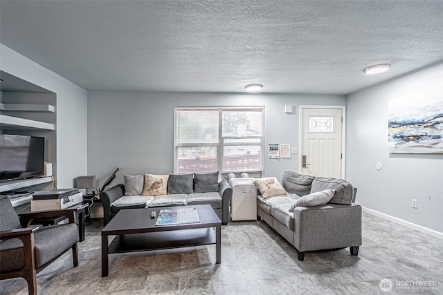 22901 114th Way SE, Kent, WA 98031 - living area featuring a textured ceiling and baseboards