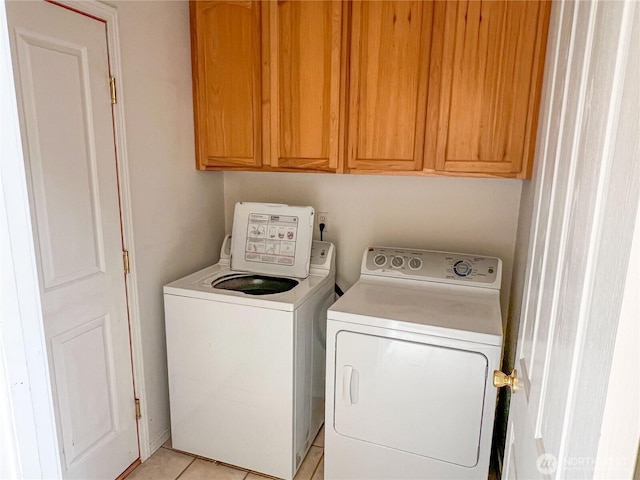 1304 Rosecrans St, Port Townsend, WA 98368 - laundry room featuring washing machine and clothes dryer and cabinet space