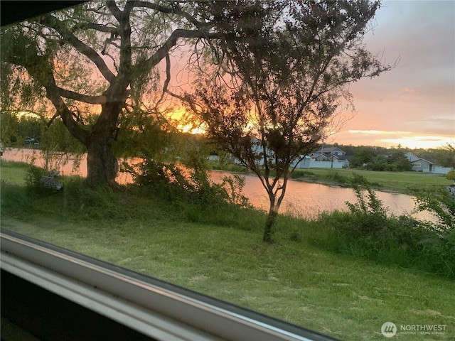 4440 Sucia Dr, Ferndale, WA 98248 - yard at dusk with a yard and a water view