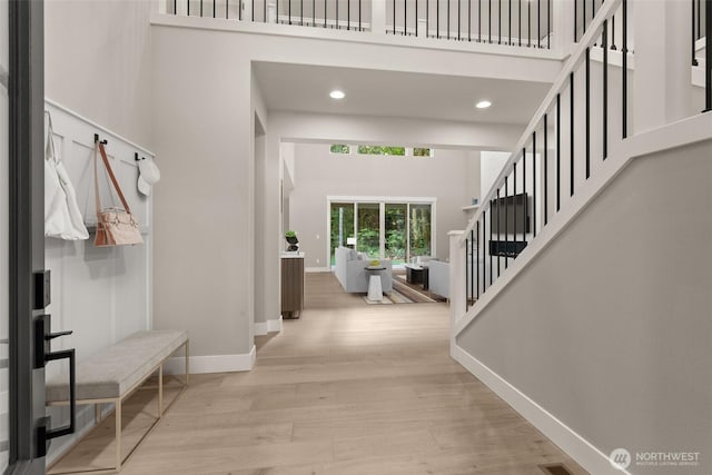 2446 64th Ave NW, Olympia, WA 98502 - entryway with a high ceiling, baseboards, wood finished floors, stairway, and recessed lighting