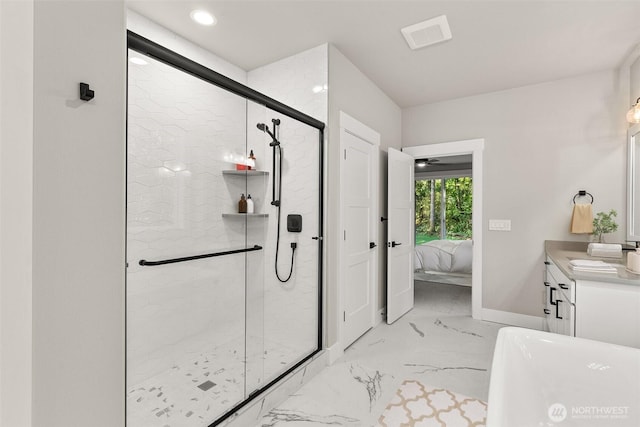 2446 64th Ave NW, Olympia, WA 98502 - full bathroom featuring ensuite bathroom, a shower stall, vanity, a freestanding bath, and baseboards