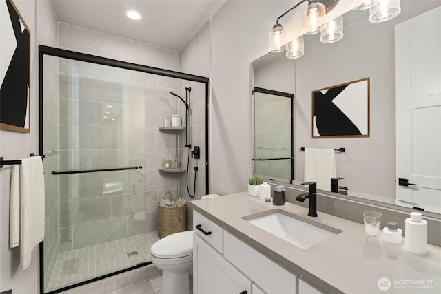 2446 64th Ave NW, Olympia, WA 98502 - full bathroom featuring vanity, toilet, a shower stall, recessed lighting, and tile patterned flooring