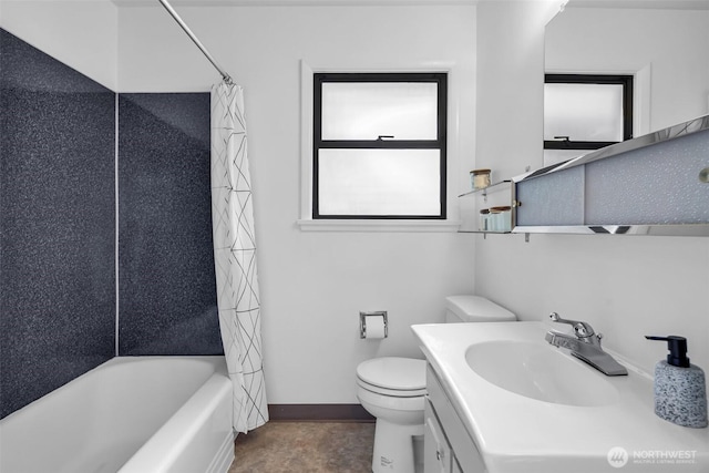4619 SW Genesee St, Seattle, WA 98116 - bathroom with toilet, baseboards, vanity, and shower / tub combo