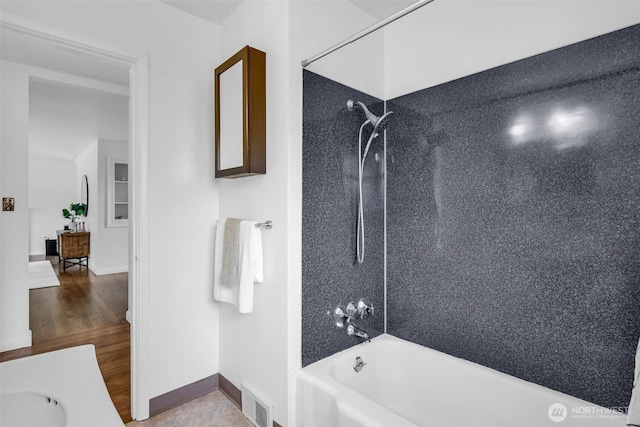 4619 SW Genesee St, Seattle, WA 98116 - full bath with washtub / shower combination, baseboards, vanity, and wood finished floors