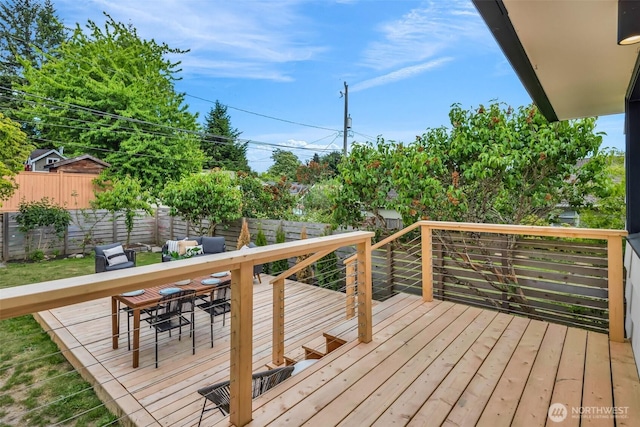 4619 SW Genesee St, Seattle, WA 98116 - wooden terrace featuring a fenced backyard and outdoor dining space