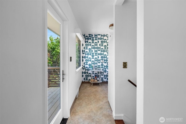 4619 SW Genesee St, Seattle, WA 98116 - corridor featuring an upstairs landing and baseboards