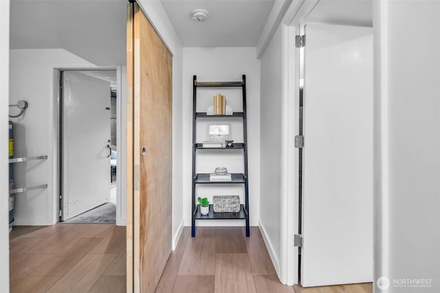 4619 SW Genesee St, Seattle, WA 98116 - corridor featuring light wood-type flooring