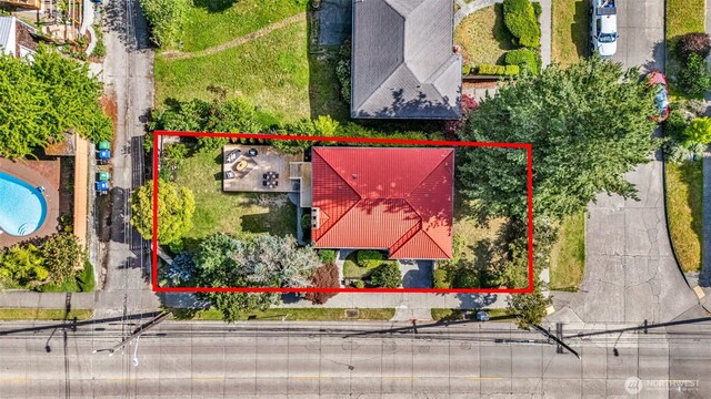 4619 SW Genesee St, Seattle, WA 98116 - aerial view of property and surrounding area featuring a pool area and property parcel outlined