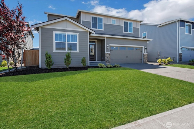 924 Livernash St, Buckley, WA 98321 - view of front facade with concrete driveway, an attached garage, and stone siding