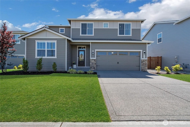 924 Livernash St, Buckley, WA 98321 - view of front facade featuring driveway, an attached garage, and stone siding