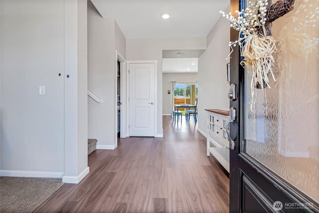 924 Livernash St, Buckley, WA 98321 - foyer with wood finished floors, stairway, and baseboards