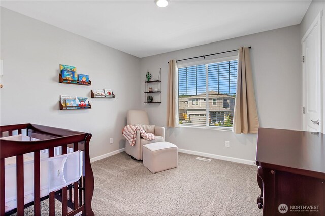 924 Livernash St, Buckley, WA 98321 - bedroom with baseboards, a nursery area, and carpet flooring