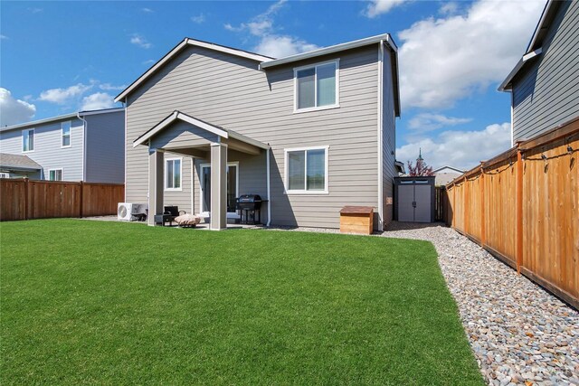 924 Livernash St, Buckley, WA 98321 - back of property featuring a patio and a cooling unit