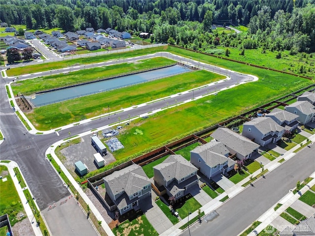 924 Livernash St, Buckley, WA 98321 - aerial view of residential area featuring a large body of water and a forest