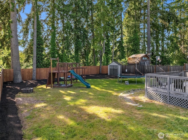 18312 73rd Ave W, Edmonds, WA 98026 - view of yard with a fire pit, a playground, and a deck