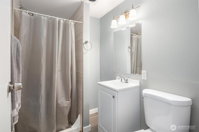 18312 73rd Ave W, Edmonds, WA 98026 - bathroom featuring vanity, toilet, and a shower with shower curtain