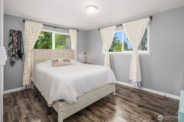 18312 73rd Ave W, Edmonds, WA 98026 - bedroom featuring multiple windows, baseboards, and wood finished floors