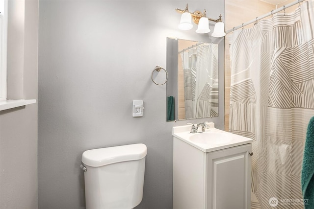 18312 73rd Ave W, Edmonds, WA 98026 - full bath featuring toilet, vanity, and a shower with shower curtain