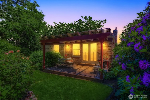 6045 Seward Park Ave S, Seattle, WA 98118 - outdoor structure at dusk featuring a pergola and a yard