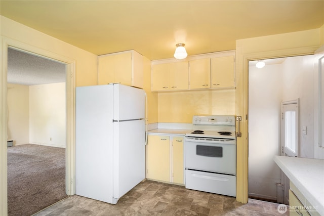 8608 16th Ave SW, Seattle, WA 98106 - kitchen with white appliances, light countertops, and a baseboard heating unit