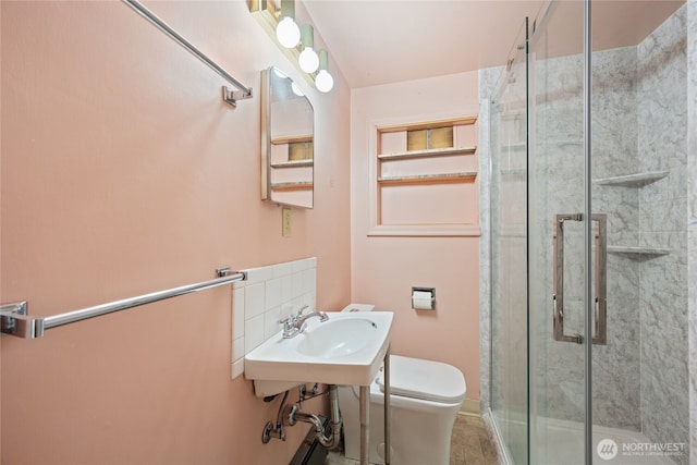 8608 16th Ave SW, Seattle, WA 98106 - bathroom featuring a shower stall and tasteful backsplash