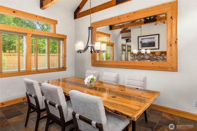 16375 NE 44th Ct, Redmond, WA 98052 - dining area featuring baseboards, a chandelier, and stone tile flooring