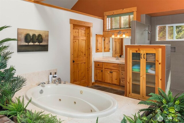 16375 NE 44th Ct, Redmond, WA 98052 - bathroom featuring a tub with jets and vanity