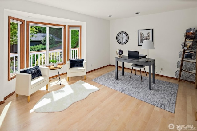 8533 NE Juanita Dr, Kirkland, WA 98034 - home office with plenty of natural light, wood finished floors, baseboards, and recessed lighting