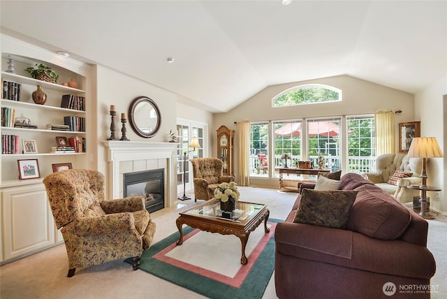 418 158th Pl NW, Arlington, WA 98223 - living area with light colored carpet, a tile fireplace, and lofted ceiling