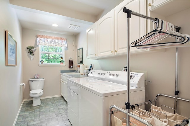 418 158th Pl NW, Arlington, WA 98223 - washroom featuring independent washer and dryer, baseboards, and stone finish floors