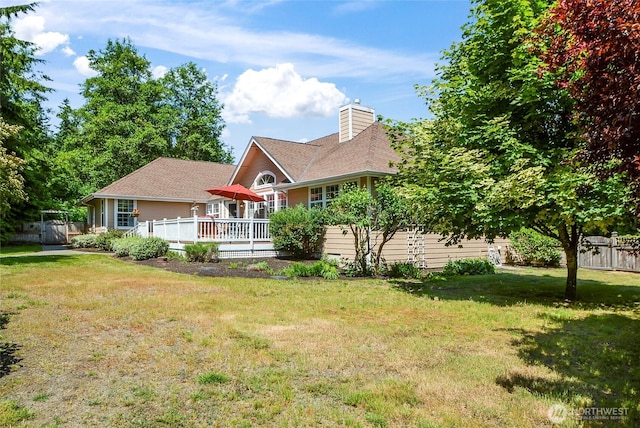 418 158th Pl NW, Arlington, WA 98223 - view of front of property featuring a chimney, a deck, and roof with shingles