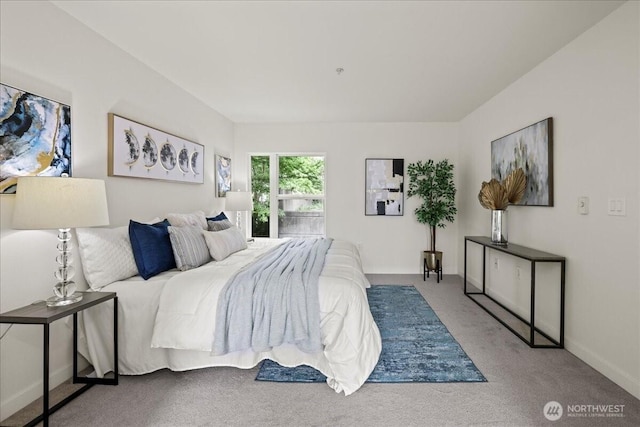 4343 Roosevelt Way NE Unit 102, Seattle, WA 98105 - carpeted bedroom featuring baseboards