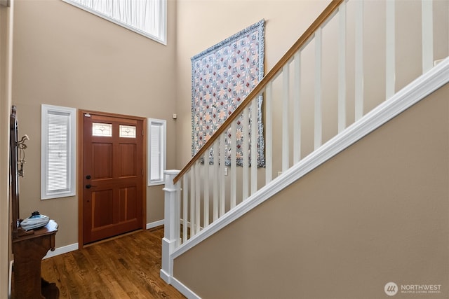 16520 136th Ave E, Puyallup, WA 98374 - entryway with a towering ceiling, stairs, wood finished floors, and baseboards
